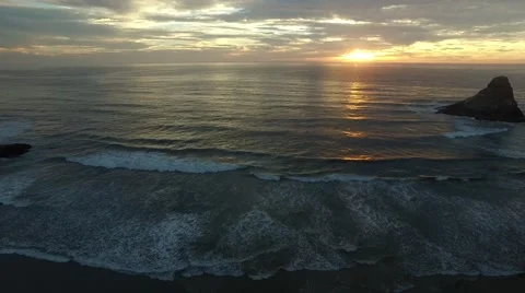 Slow pan to beautiful lighthouse and sunset on Oregon Coast Stock Footage 55808282