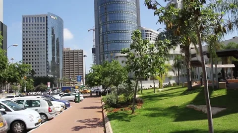 Slow pan the camera from street to the top of a tall building Stock Footage 40841198