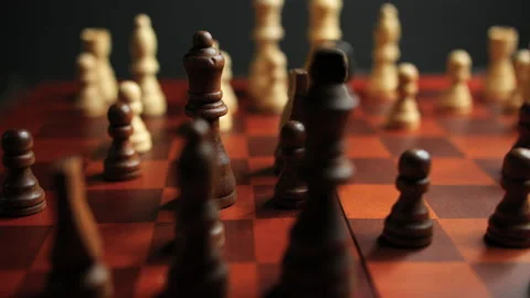 Slow Pan Close Up of Chess Pieces on a Chessboard Stock Footage 236948185
