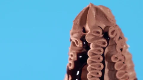 Slow pan down a decorative chocolate ice cream Video stock 127933070