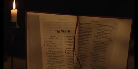 Slow pan down over bible Stock Footage 126077597