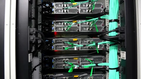 Slow Pan Down Rear of Server with Connected Network Cables and Blinking Light Stock Footage 341696791