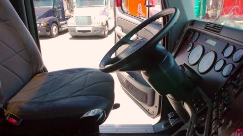 Slow pan of empty interior of freight liner truck dashboard Stock-Footage 60032438