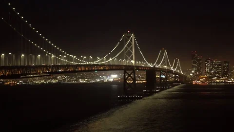 Slow pan of famous Bay Bridge of Silicon Valley, California that connects the Видео 89560341