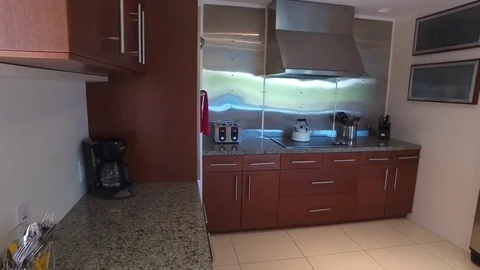 Slow pan of a kitchen of house in Palm Springs known as the Martini House Stock Footage 75461995