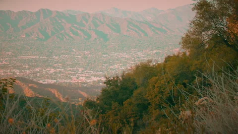 A slow pan left over the valley from the Beaudry Loop Trailhead in Glendale, CA. Video stock 281986036