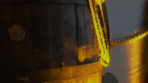 Slow pan up of old barrels and bottles. Speakeasy style. Stock Footage 104385656