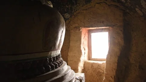 Slow pan over the ancient painted interior of the Luri Gompa cave monastery, Stock Footage 344530640