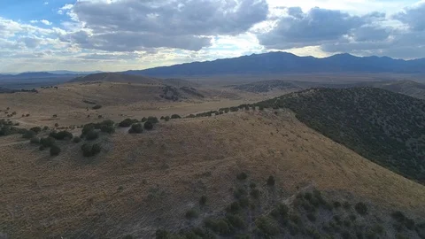 Slow Pan Over High Desert Mountains at Sunset Stock Footage 78951149