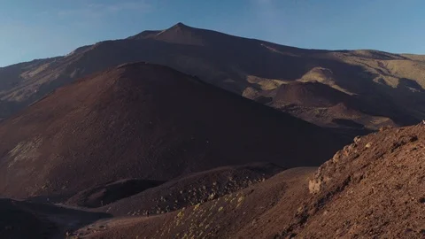 A slow pan over the Mount Etna, revealing a foot path Stock Footage 88560384