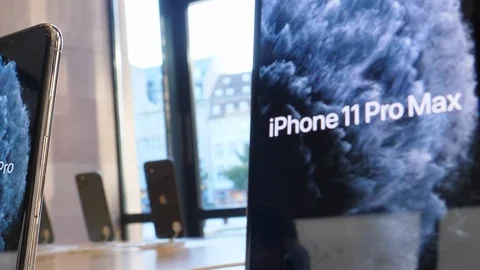 Slow pan over new iPhone 11, 11 Pro and Pro Max are displayed as the smartphone Video stock 126356427