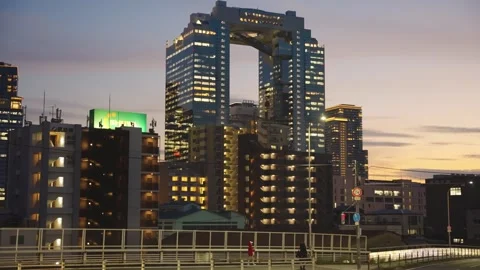 Slow pan over Umeda Sky Buildings and City Center on warm night Stock Footage 325510914