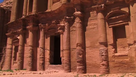Slow Pan Up of Petra's Monastery (El Deir) - Beautiful Sunny Day Stock Footage 84293239