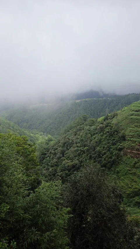 Slow Pan Reveals Layered Hillside Farms And Lush Crops Fading Into Luzon Mist Stock Footage 346859186
