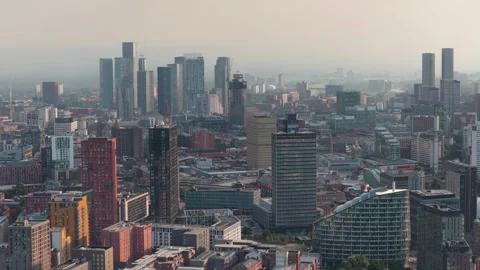 Slow pan right over Manchester Skyline Aerial footage Shot UK 스톡 동영상 341987557