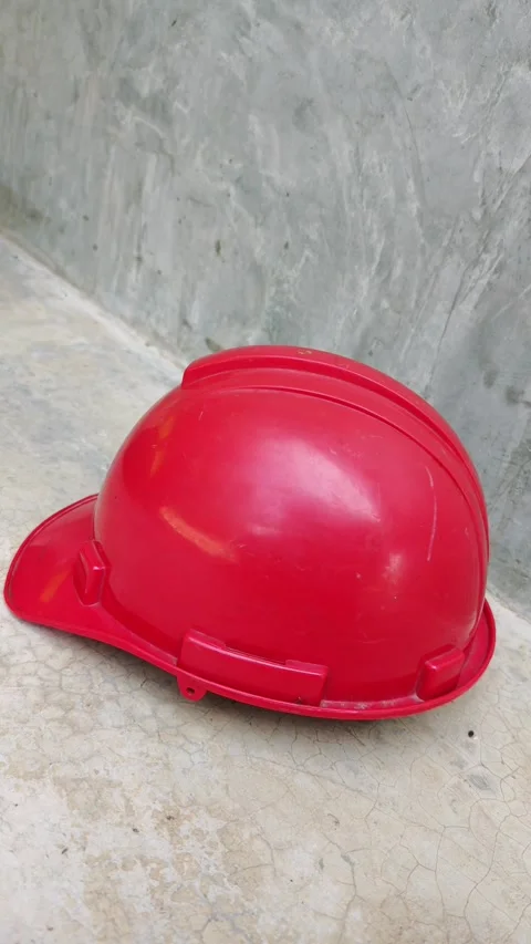 Slow pan right of white safety helmet hardhat resting. Video stock 333392031