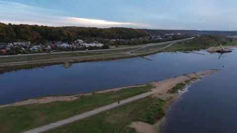 Slow pan of river junction between Nemunas and Neris Stock Footage 254467330