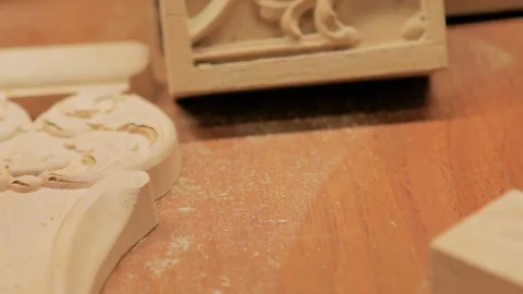 Slow pan shot of carpenter workplace with wooden things and tools. Video stock 85588670