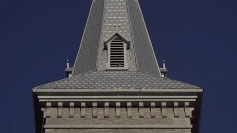 Slow Pan From Steeple Cross to Front Approach to Church Stock Footage 243717700