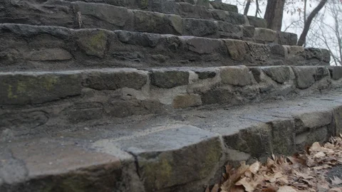 Slow pan up of stone steps Stock Footage 104463615