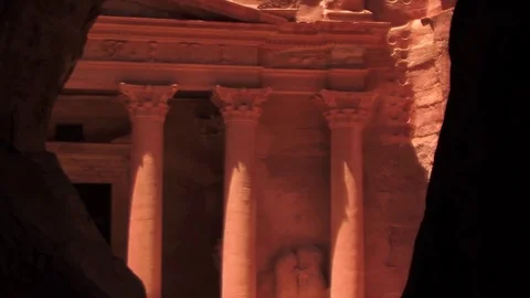 Slow Pan Up of the Treasury Framed by the Siq (Petra) Stock-Footage 84293309