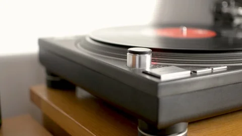 Slow pan vinyl record turntable in motion Stock Footage 88974427