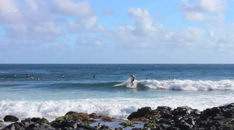 Slow Pan from Waves to Beach Stock Footage 1046445