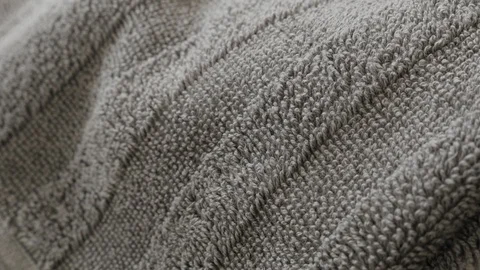 Slow panning over the texture of grey towel 4K video Stock Footage 120829058