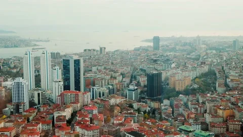 Slow Panning: Rooftop view of ancient Turkish district, Bosphorous Strait in Stock Footage 201412860