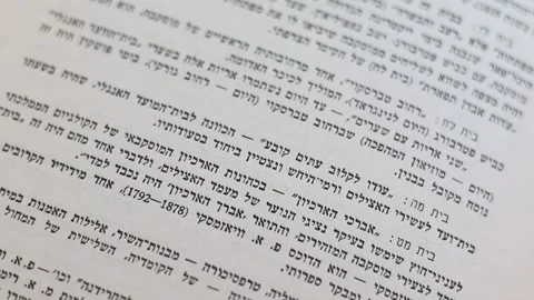 Slow panning shot of Hebrew Text in Book Video stock 148076581