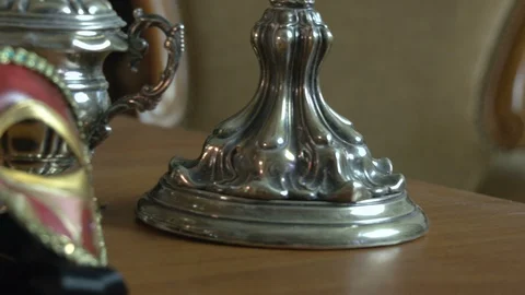 Slow Panning on vintage silverware ancient inkwell and venetian mask FDV 動画素材 120793979