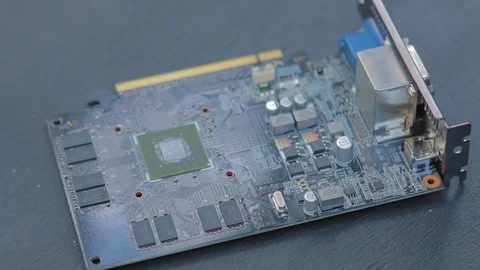 Slow panorama of GPU ( graphic processing unit ) circuit board. Video stock 76942187
