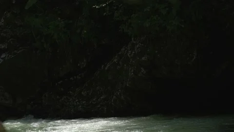 Slow panorama from rocks to the wind river. Video stock 134512695