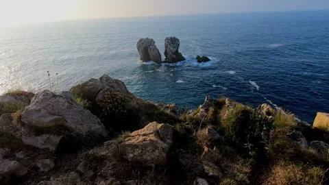 Slow panoramic view from a rocky cliff at Costa Quebrada, Cantabria, Spain,.. Stock Footage 343227461