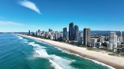 Slow Panoramic view of surfers paradise neaches, Stunning dat, drone Vídeo Stock 328988133