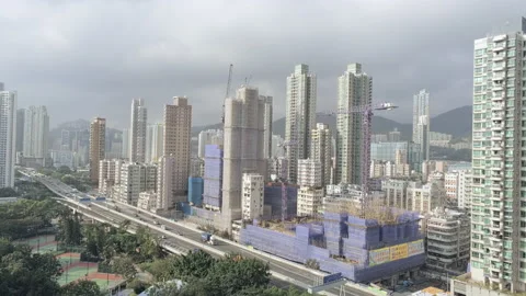 Slow pedestal move up and down. Aerial drone shot on high rise buildings and  動画素材 172114855
