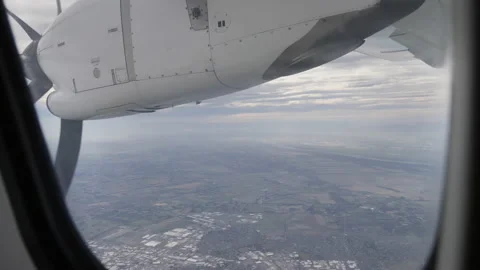 Slow Plane Propeller Out Window Shot Over Farm Land Stock Footage 171786979