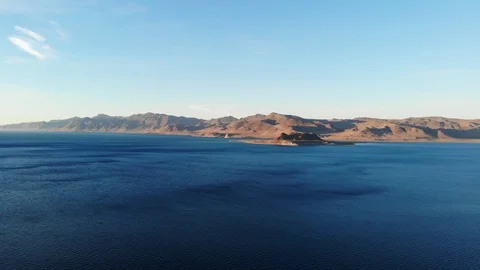 Slow Pull Back of Pyramid Lake Nevada at Sunset over Shore - Aerial Drone Stock Footage 112633309