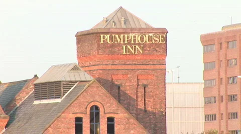 Slow Pull out from Old Pump House to Wide of dock and Maritime Museum (Liv018) Stock Footage