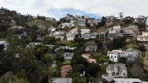 Slow Push In and Hold on White Mansion in the Hollywood Hills - (4k, Drone, DJI) Stock Footage 93643213