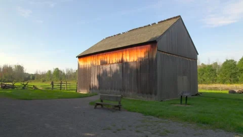 Slow Push in Brigham Youngs barn shot near the frame house for the Smith Family Stock Footage 293759542