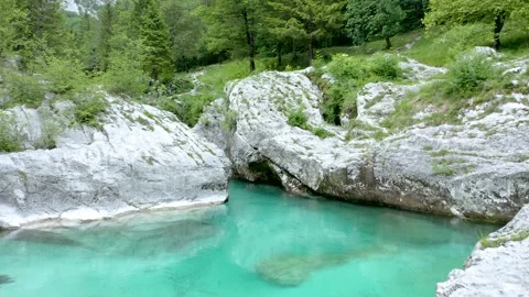 Slow Push in Shot Of Great Gorge of Emerald Soča River Surrounded With Tolmuns. Stock Footage 230328853