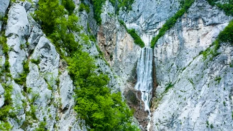 Slow Push in Shot Towards Highest Majestic Waterfall, Located in Huge Valley. Stock Footage 231199034