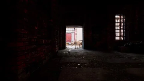 Slow Push Through Dark Abandoned Factory Interior Toward Sunlit Courtyard Stock Footage 342111258