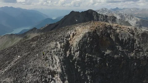 Slow Push Towards Hiker Reaching Mountain Summit Stock Footage 314813032