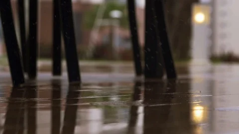 Slow: rainy day - drops falls on the wooden floor Stock Footage 128031041