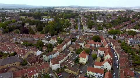 A slow reverse flight over the Somerset town of Frome Stock Footage 343693883
