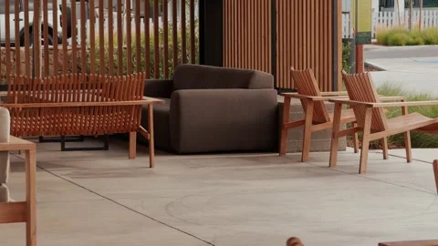 Slow Reverse Reveal of Outdoor Seating and Wood Slat Patio Stock-Footage 339983578
