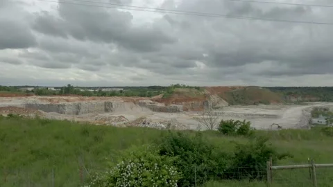 Slow Rise and Pull Drone Shot Over a Quarry in Northwest Arkansas Stock Footage 154477008