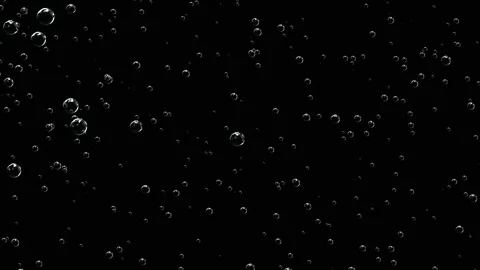 Slow rise of bubbles on a dark background. Stock Footage 126000331
